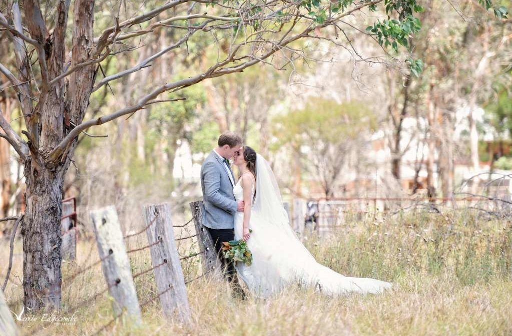 A couple hugging amid a bushland – Appin House