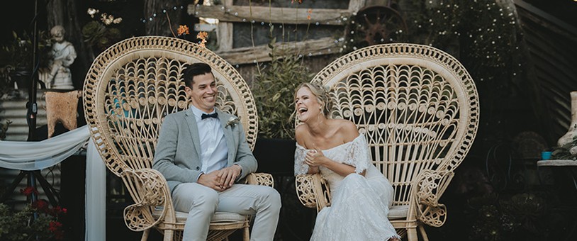 A wedding couple laughing at Oakdene Vineyards and Cellar Door