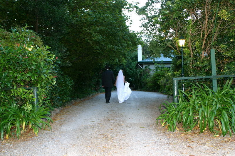 Wedding couples walking away at Wood Sheerbrooke