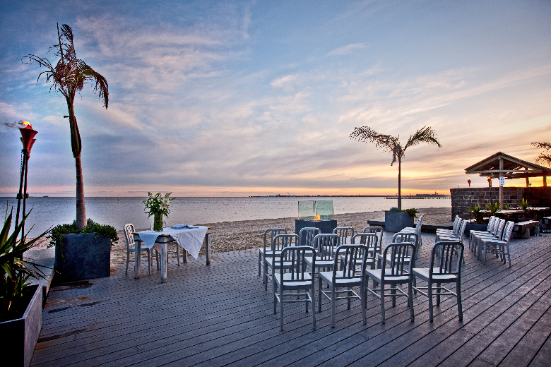 A wedding set-up on the deck of Sandbar Beach Cafe overlooking the ocean